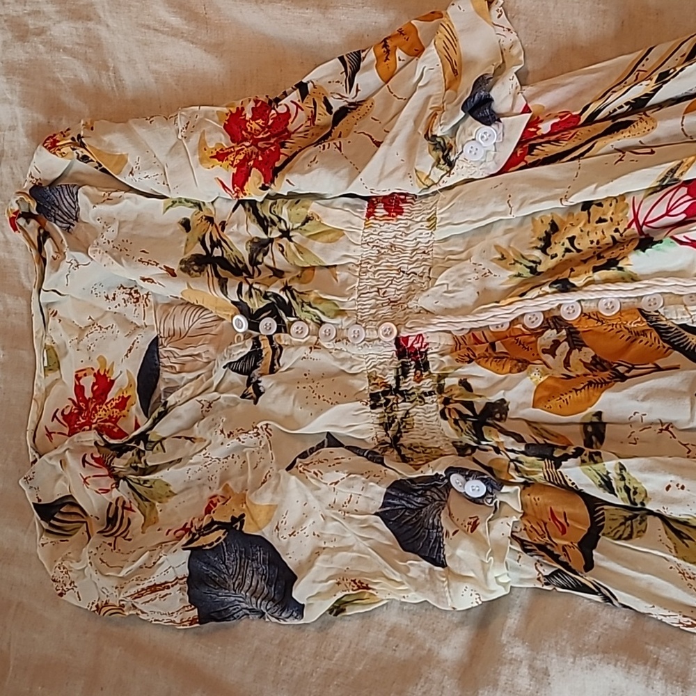 Long floral dress. Elbow length sleeves.